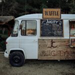 white van with brown wooden board