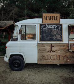 white van with brown wooden board